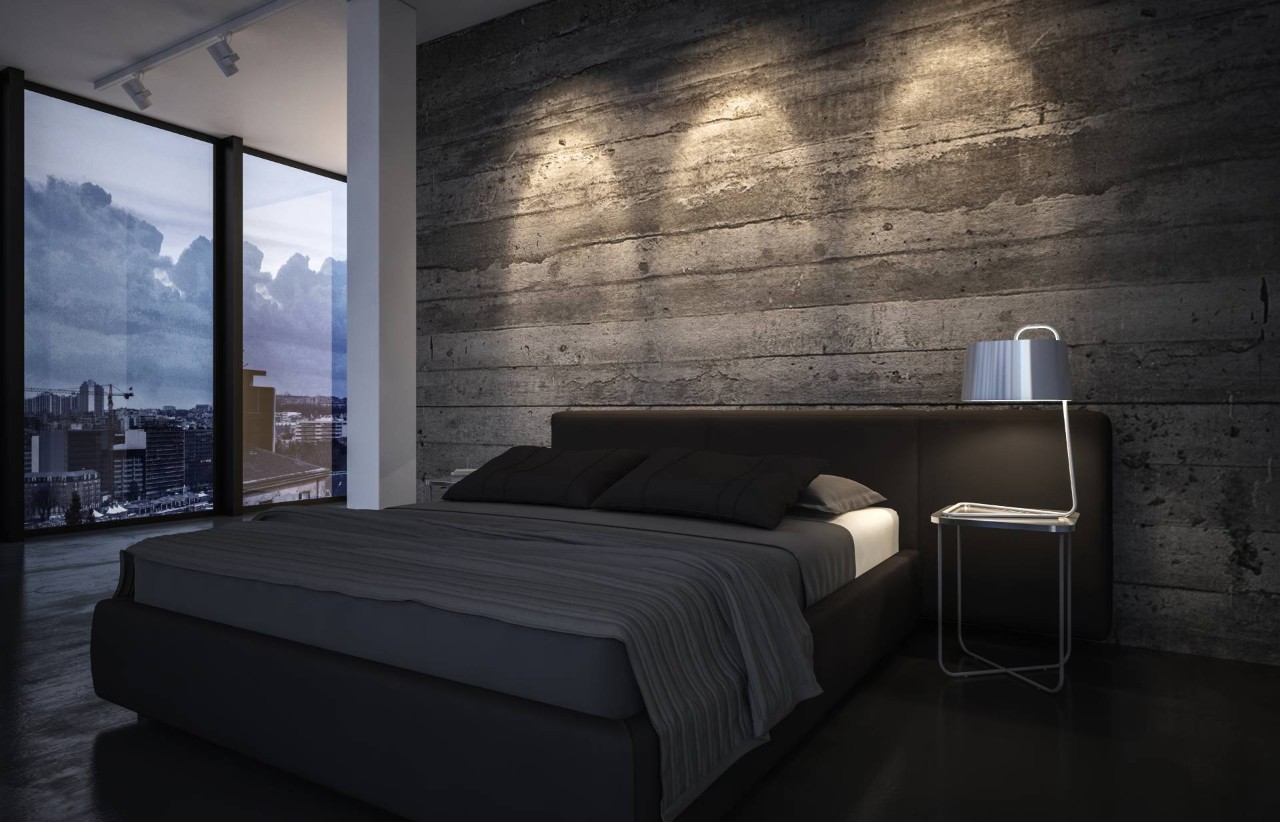 A moody bedroom with a rustic wooden accent wall, dark furniture and linens, and large windows at Interior Re-Styling near Council Bluffs, IA