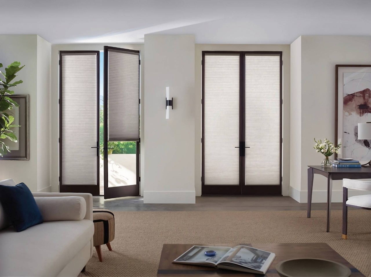 Hunter Douglas Duette® Cellular Shades with the Vertiglide™ system on French Doors in a living room at Interior Re-Styling near Council Bluffs, IA